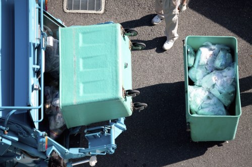 Curbside collection service disposing of furniture in South Norwood