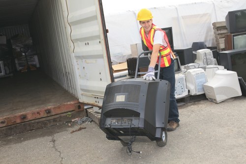 Team members sorting items during garage clearance