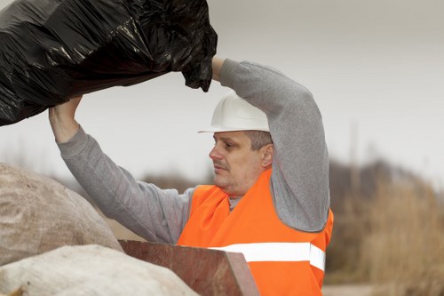 Professional team handling furniture disposal